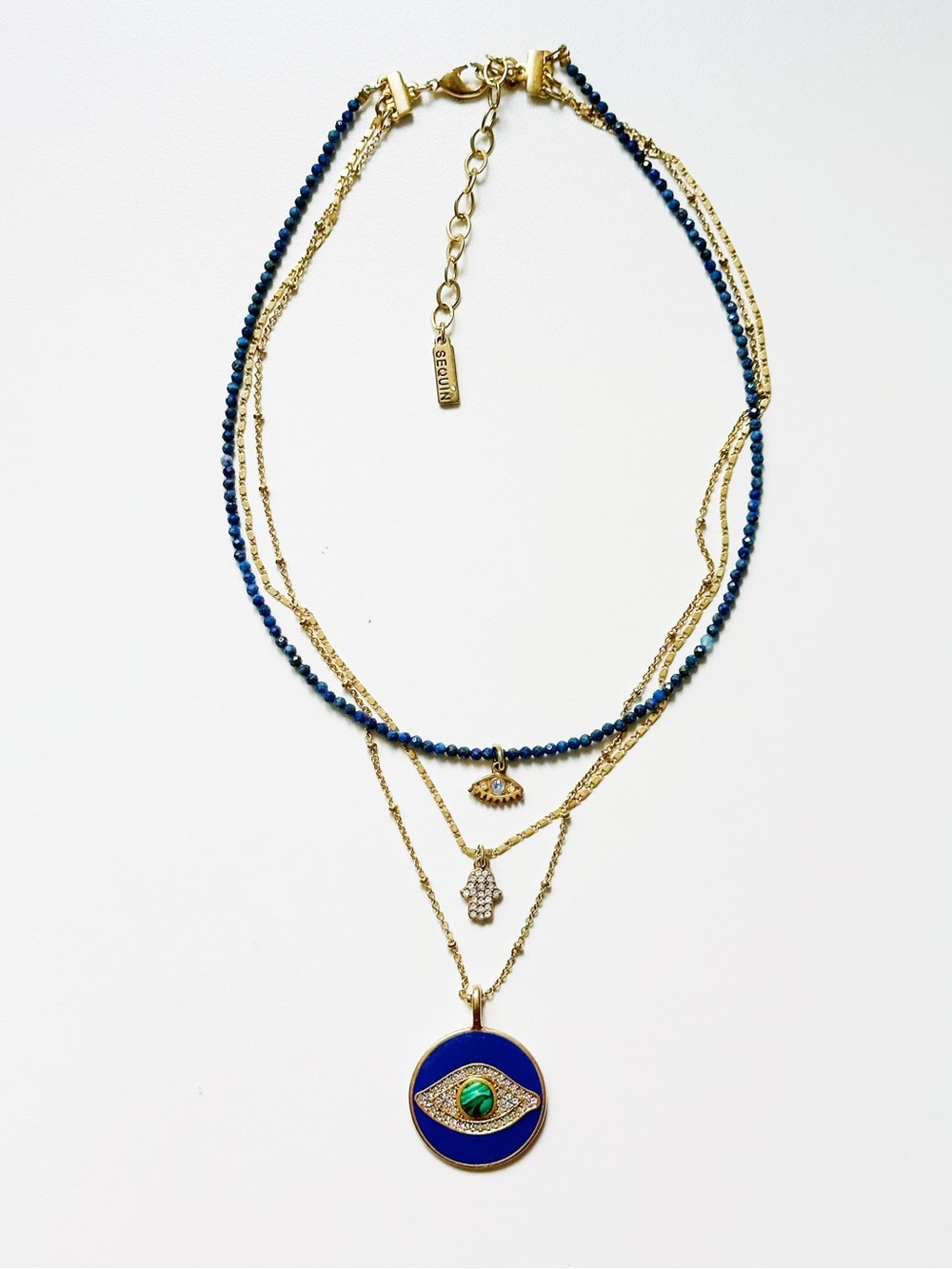 Gold Multi-Layer Brass Necklace with Navy Beads and Blue Evil Eye Pendant